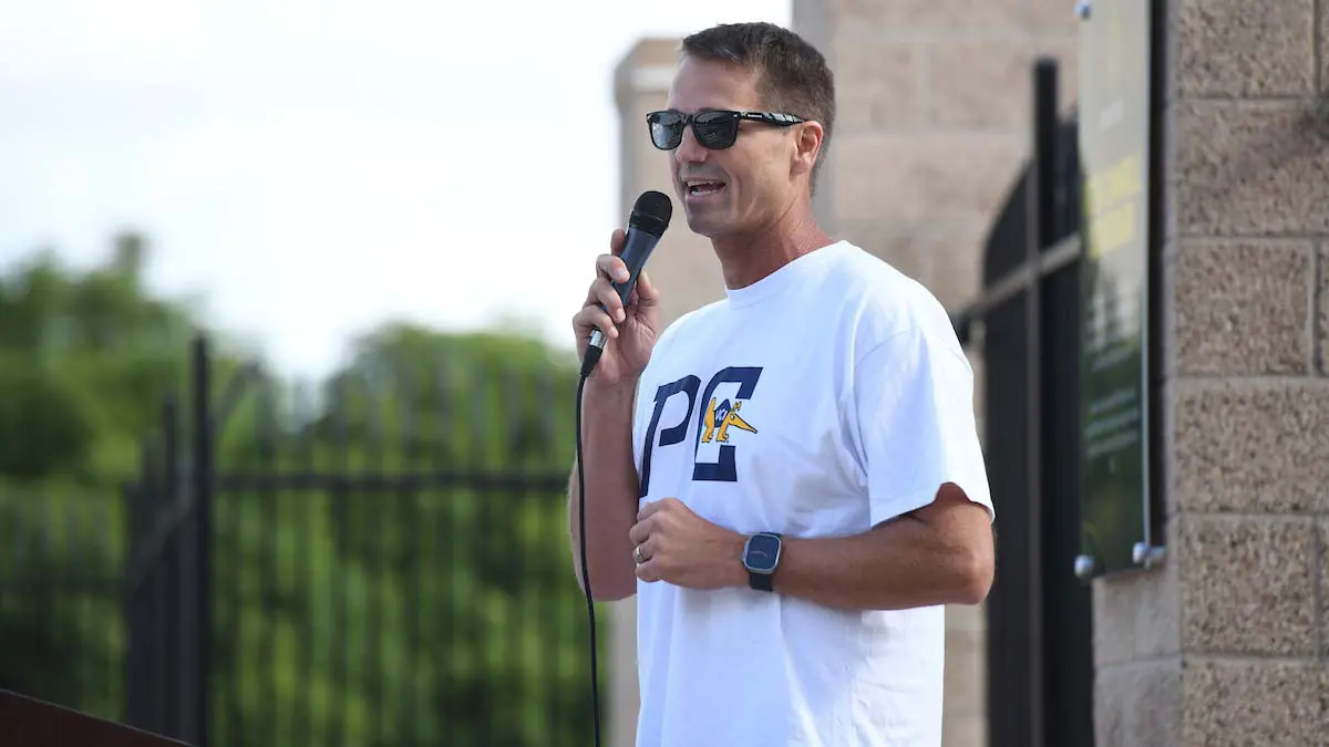 A man speaking into a microphone